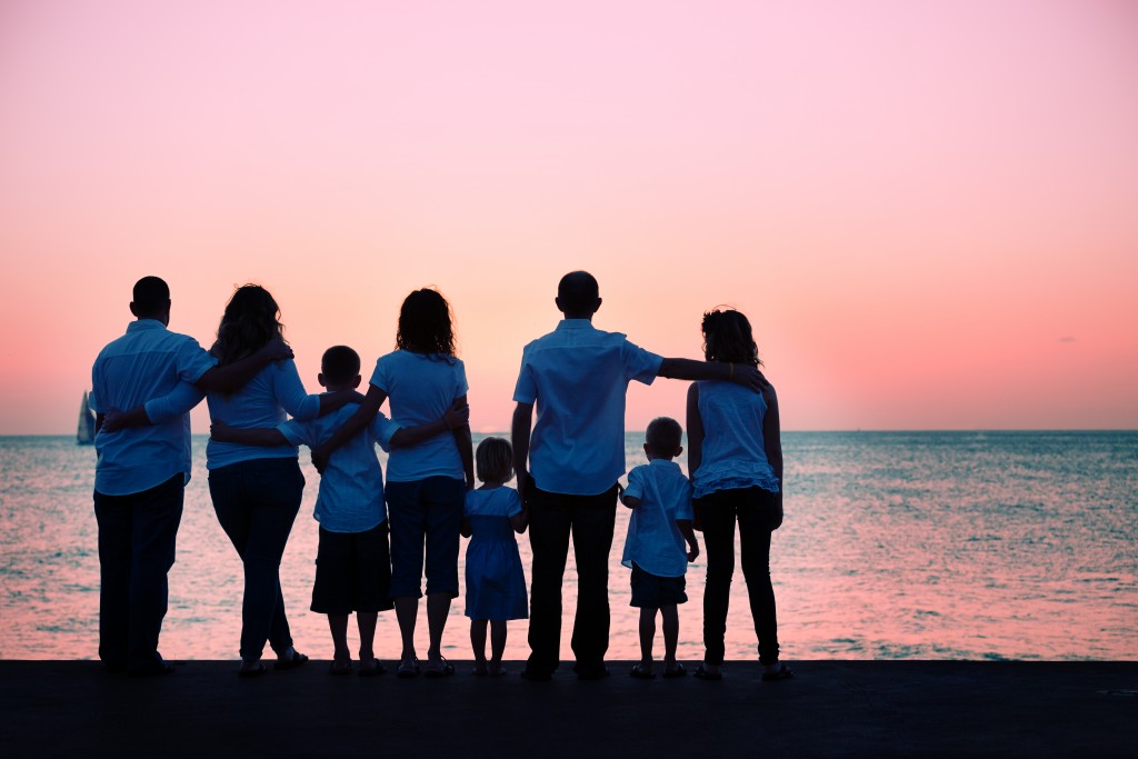 Big family watching the sunset